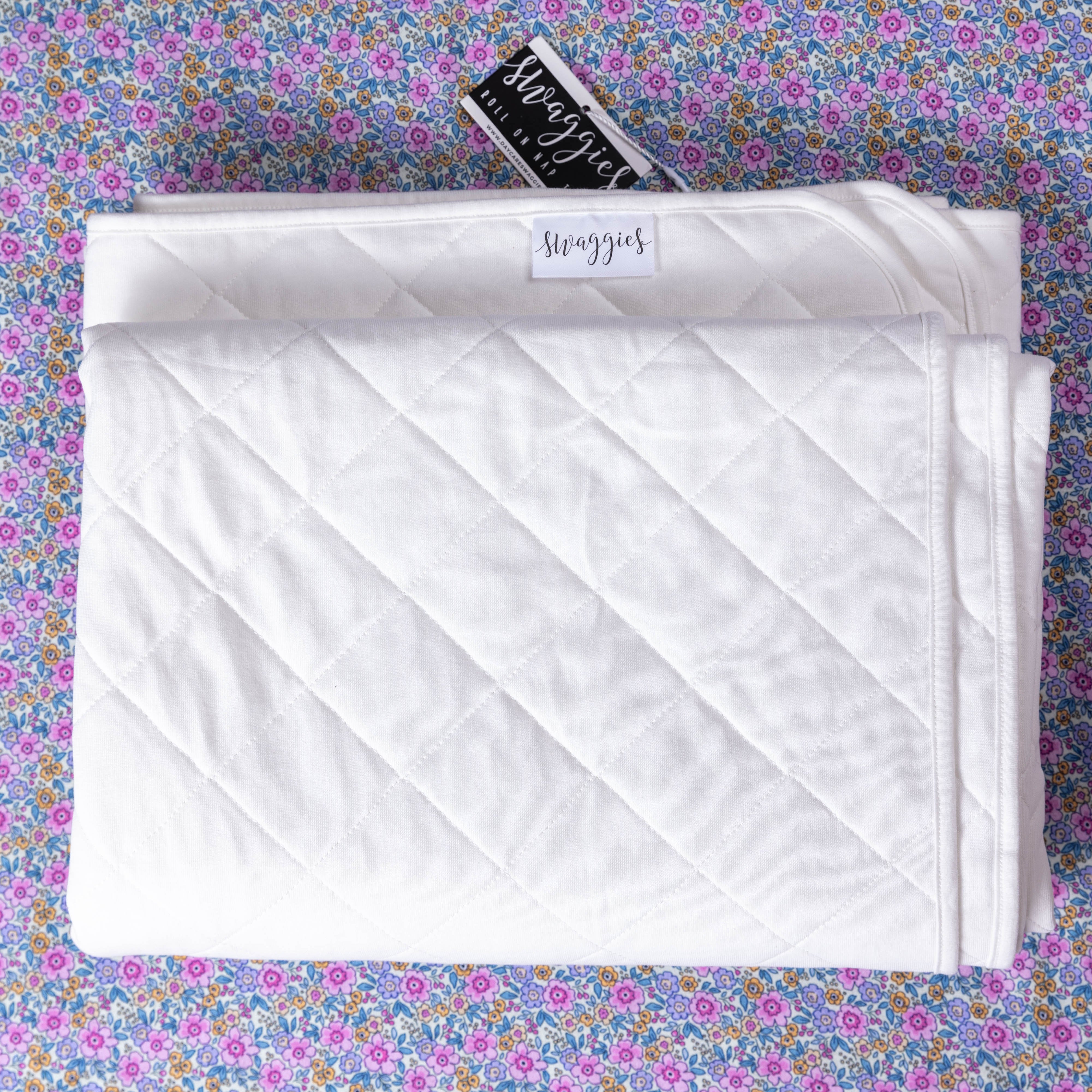 Snow - 118cm (W) x 140cm (L) jersey cotton deluxe quilted cot blanket